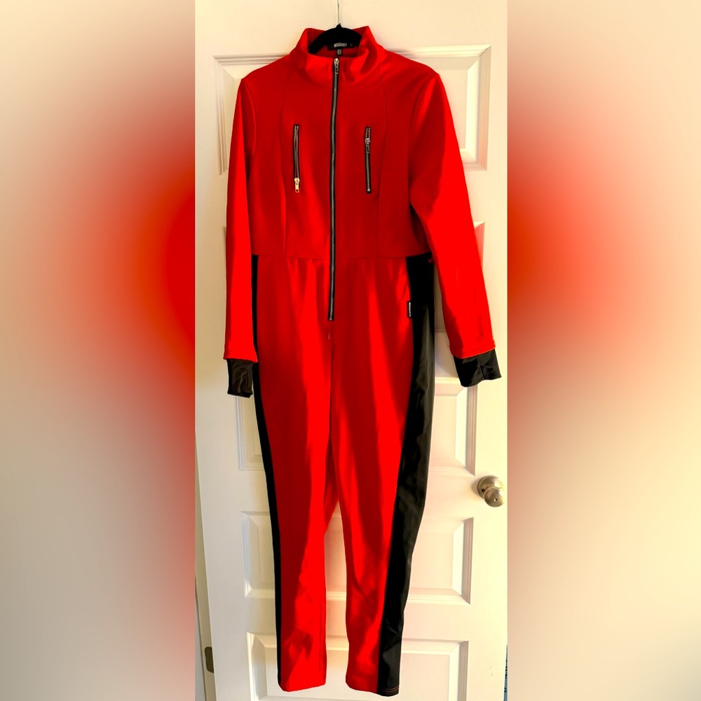 Red and black Missguided Ski Suit Size US 12, missing belt